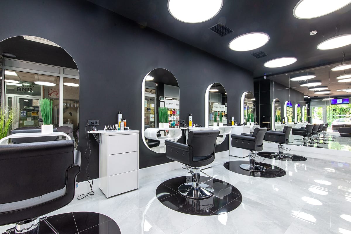 Styling chairs and mirrors inside a beauty salon